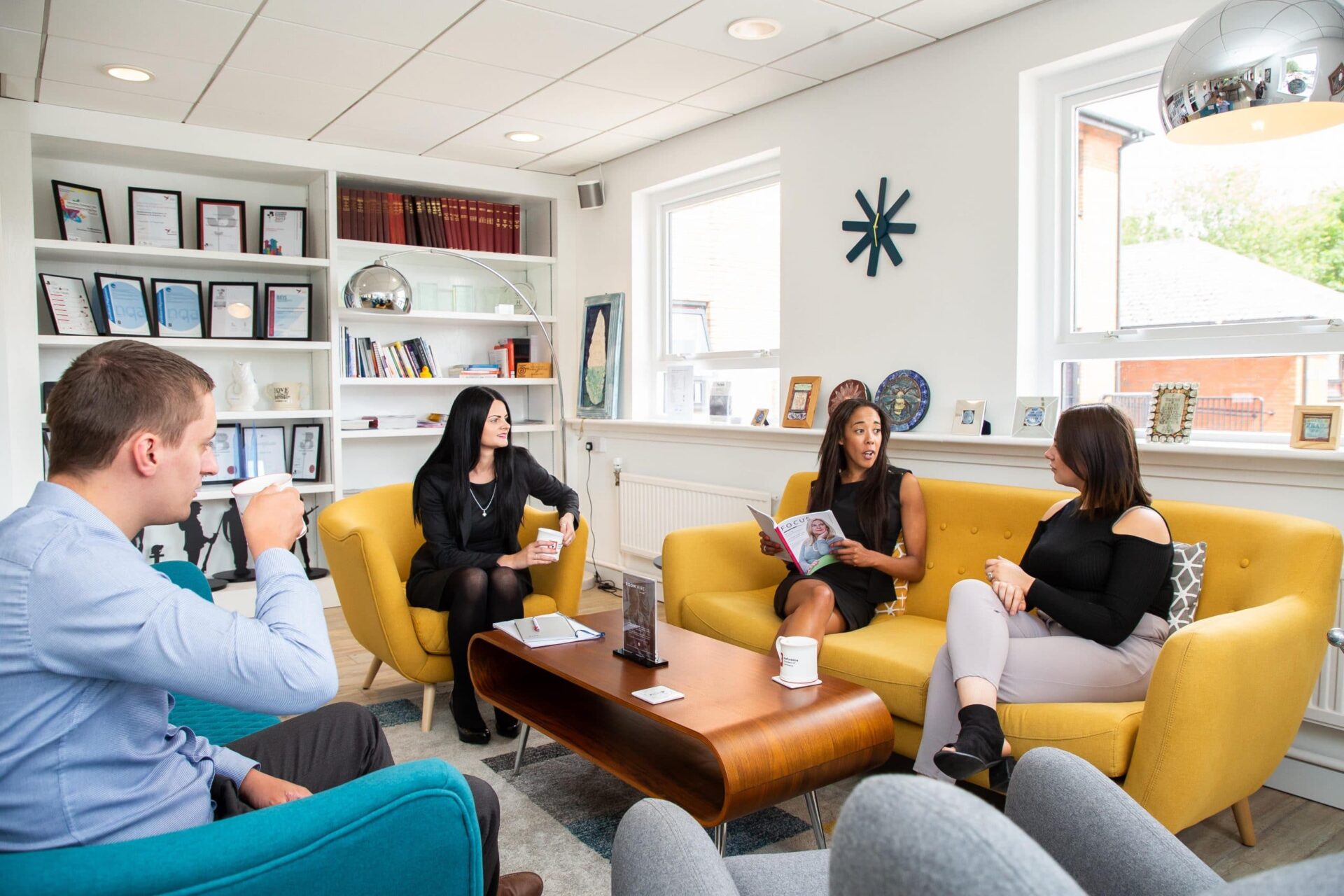 People in the Members' Lounge in a meeting