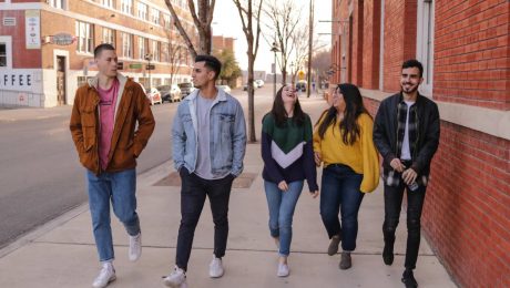 Group of young people walking on a street