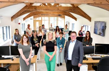 Planterra 1 Michelin team pictured in an office with desktops