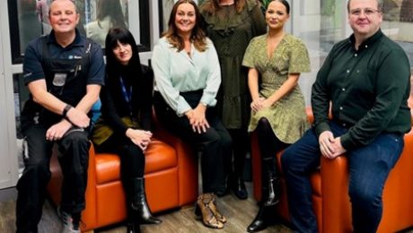 The BusinessLodge Stoke team photographed in a bright co-working space as they are recognised for Excellence in Customer Service