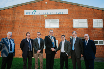 Opening of Wells Plastics.