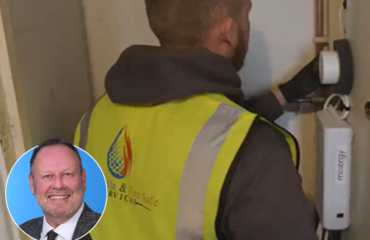 smaller 2323 Legionella & Fire Safe Services employee working.