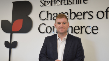 Chris Plant photographed in front of Staffordshire Chambers of Commerce's Logo