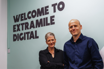 Staffordshire Marketing Agency in front of a wall graphic