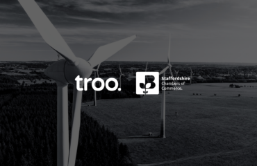 Troo Logo with Staffordshire Chambers in front of a windmill in a field