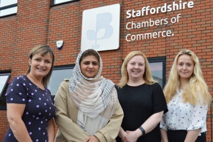 With a supported refugee, Positive Pathways Programme is pictured in front of Staffordshire Chambers of Commerce.