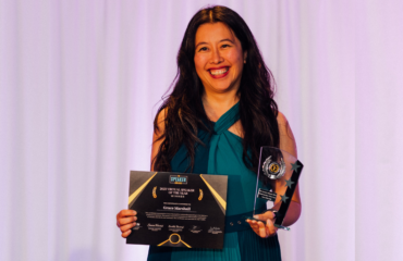 Grace Marshall, at the Speaker Awards holding her certificate and award