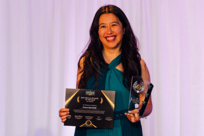 Grace Marshall, at the Speaker Awards holding her certificate and award