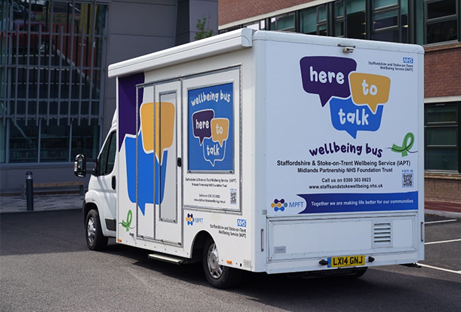 Picture of a well being buss to visit members and staff at commerce house.