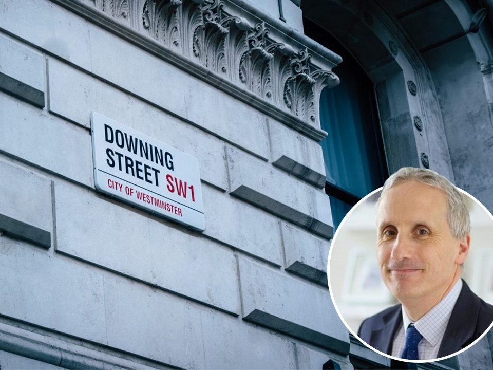 Picture of Declan Riddle and a picture of Downing street.