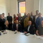 Picture of people at an event making connections hosted by Keele, and at NSCG.
