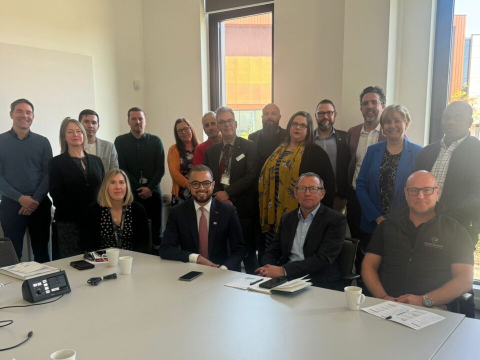 Picture of people at an event making connections hosted by Keele, and at NSCG.