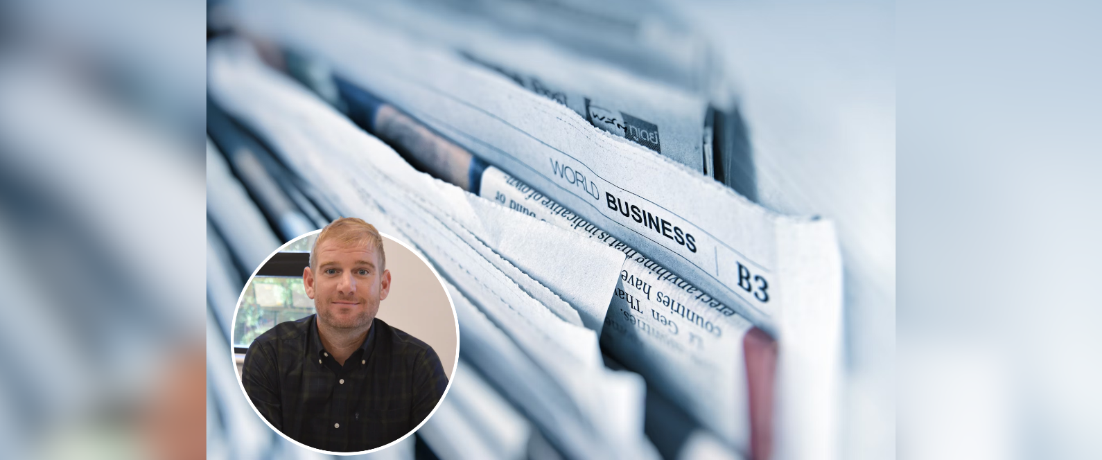 Picture of Chris plant and some newsletters behind him.