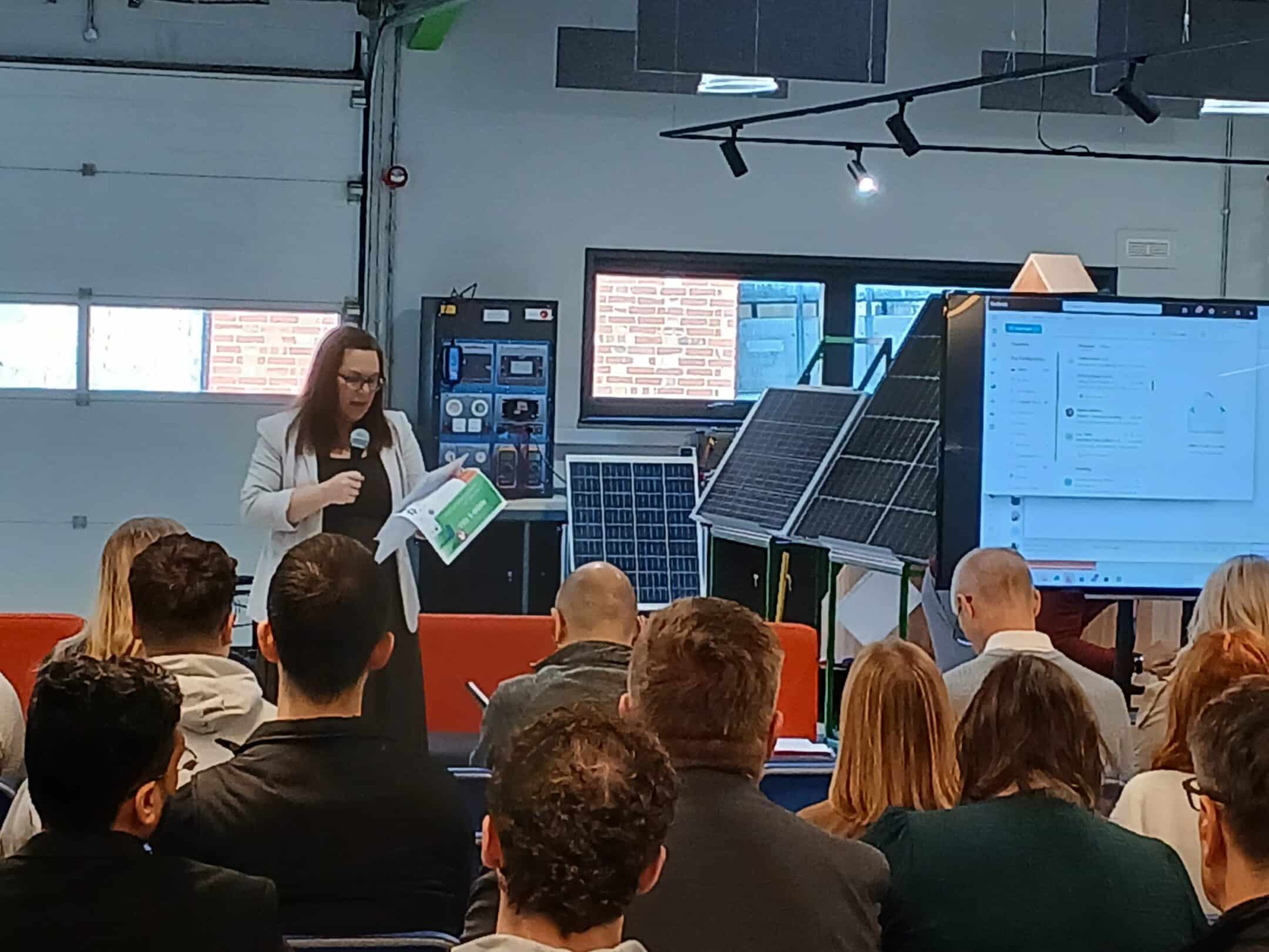 People at the AI Show and Tell Event Sitting whilst listening to a speaker.