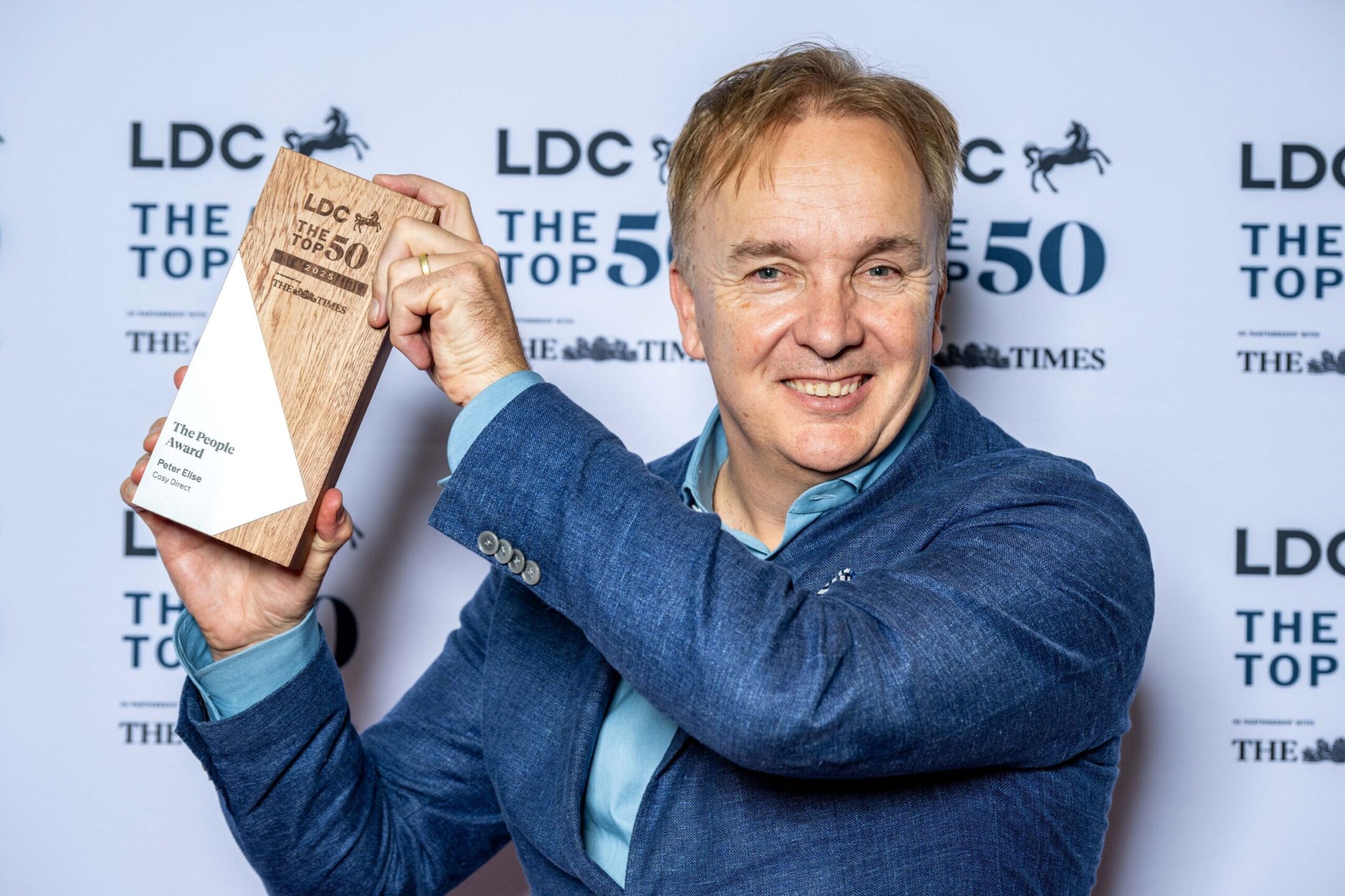 Peter Ellse, co-founder and CEO of Cosy Direct winning LDC, Top fifty award.
