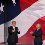 President trump and another Infront of the American flag. He was planning to impose tariffs on a number of European nations.